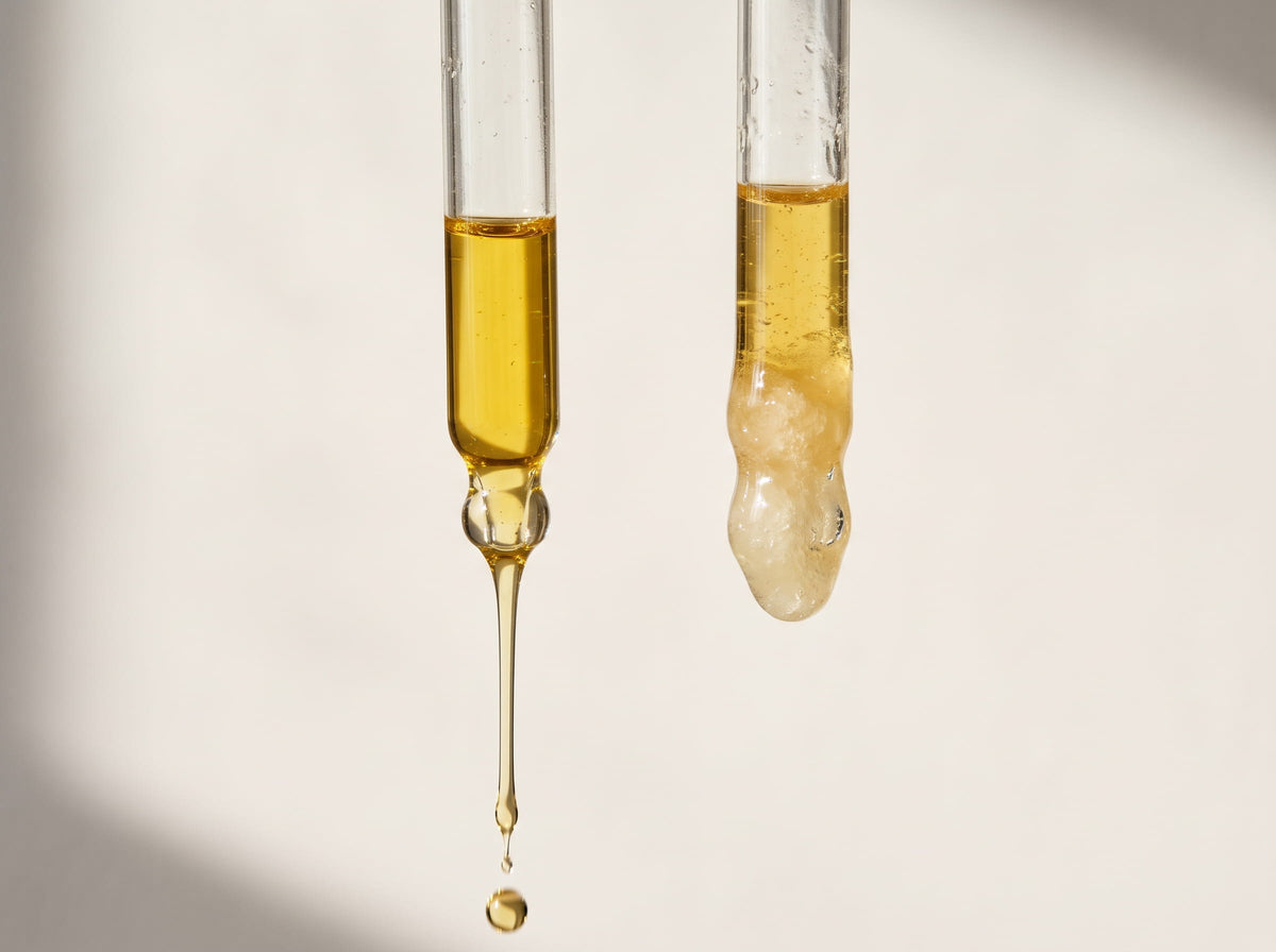 Illustration: two droppers of oil, one flowing freely, one thick